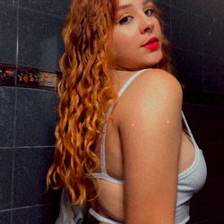 Reese Malvar in a bathroom setting, showing off her unique style.