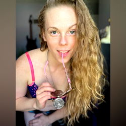 Missouri Model Artemis Jade Poses with Glasses and Keychain