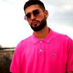 A Stylish Man in a Pink Polo Shirt