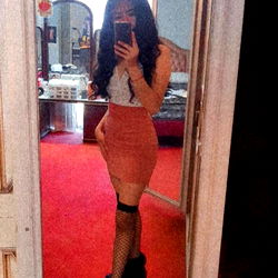 OnlyFans Model An Palafox in a Stylish Skirt and Fishnet Tights