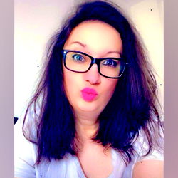 Stylish Woman With Pink Lipstick and Glasses