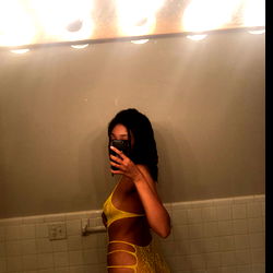 Onlyfans Model in Yellow Bathing Suit Poses in Bathroom Mirror
