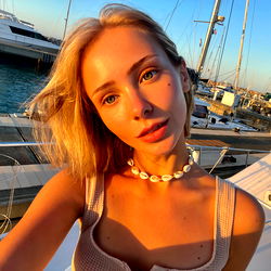 Ravie, A Model in a Boat Marina