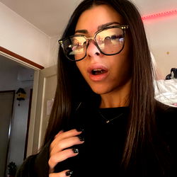 Aria, An OnlyFans Model, Strikes a Serious Pose