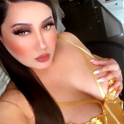 Onlyfans Model in Yellow Dress Taking Selfie