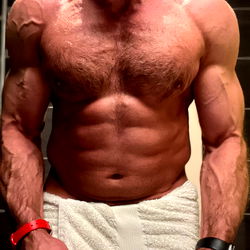 Personal Trainer Showcasing Muscles in Zurich, Switzerland