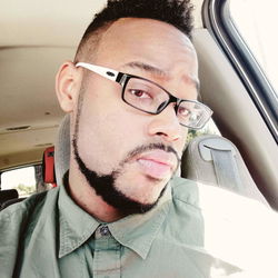 Stylish Young Man with Glasses