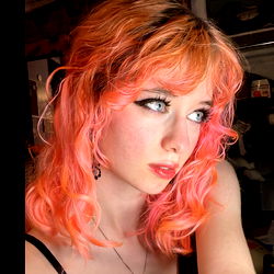 Stylized Model with Vivid Hair and Pink Eyes