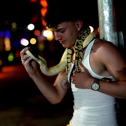 Model Photoshoot at Night with Snake