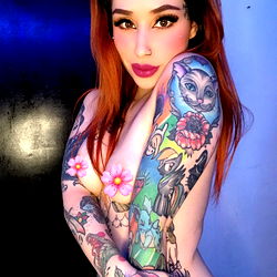 Gorgeous Tattooed Model Showcasing Her Ink