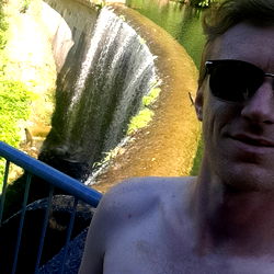 Athlete JayJay9x, Shirtless at a Scenic Waterfall