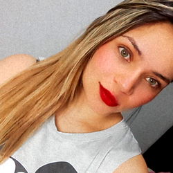 Katy, a Social Media Influencer Posing with Minnie Mouse