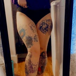 Animeslut66's Unique and Colorful Tattoos