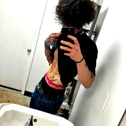 Saeja in a Restroom Mirror