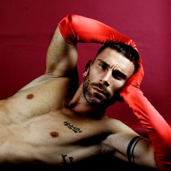 Antonio Travelxx in a Striking Red Cape