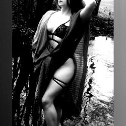 Amanda, the captivating OnlyFans model in a forest setting