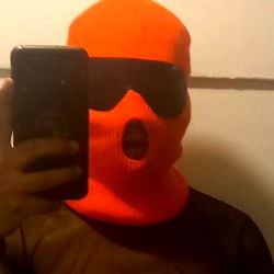 Hilarious Masked Phone Photographer