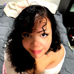 Woman with Short Hair and Curly Bangs