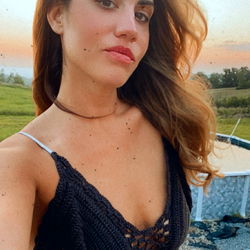 Brunette Model Poses for Social Media Photo