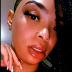 Female Model Ze Staxx with Braids and Lip Piercing