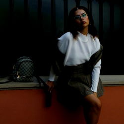 Stylish Spanish Model Posing on City Street