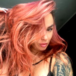 Stylish Model with Gorgeous Hair and Tattoos