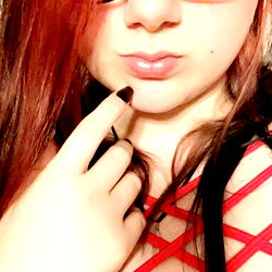 Anna: A Red-Haired Beauty in Eyeglasses