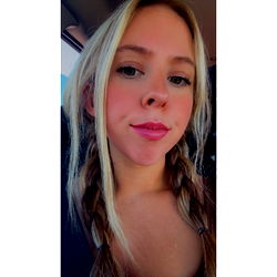 A Young Adult with Blonde Hair and Blue Eyes