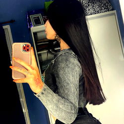 OnlyFans Model Damm<3 in a Grey Sweatshirt Taking a Selfie