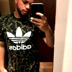 Stylish Fashionista in Camo Adidas Shirt, Taking a Mirror Selfie