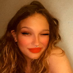 Woman in a red lipstick selfie