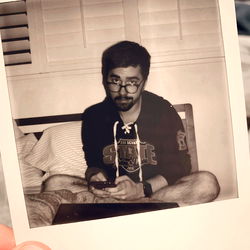 A Man Sitting in a Room