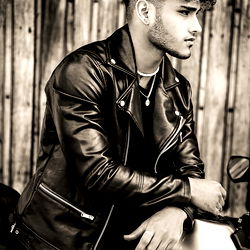 Stylish Model Alessandro Vanni in Leather Jacket and Motorcycle