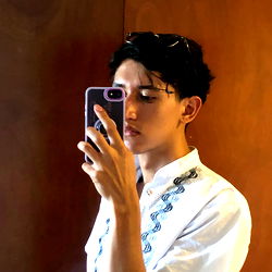 Carlos Cuervo, a Stylish and Confident Individual