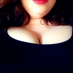 A Woman in a Black Shirt with Red Lipstick