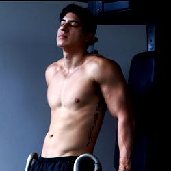 Bodybuilder Albert's Intense Training Pose