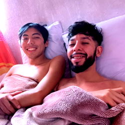 Two men sharing a bed in Tijuana