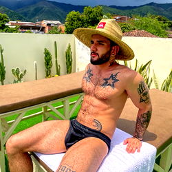 Ale Xxxtremo, Shirtless Model, Posing in Front of a Pool