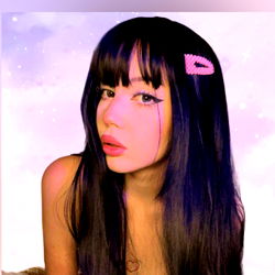 Stylized Portrait of a Model with Long Hair and Pink Accessory