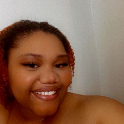 Nichole Poses in a Bathroom