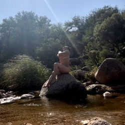 Luz on rocks in desert