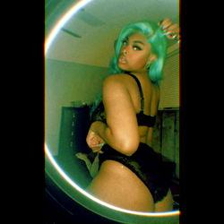 Ambitious Desires: Stunning OnlyFans Model in Bold Blue Lingerie