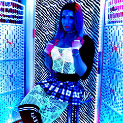 Female Model in Neon-lit Environment