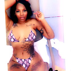Theyhateara, Exotic Beauty: OnlyFans Model Poses in Bikini with Tattoos