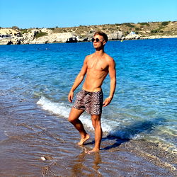 Liam Moore - Young Swedish Model Standing on Beach
