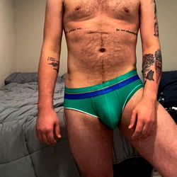 OnlyFans Model KindaOtter Striking a Pose in Sports Bra and Boxers