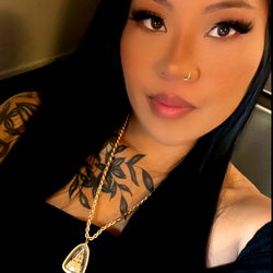 Letaaah, a striking OnlyFans model poses for the camera