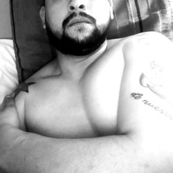 A Young Adult Male with Tattoos