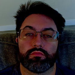 Man with a beard in a beard chair