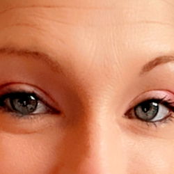 Woman with vibrant blue eyes